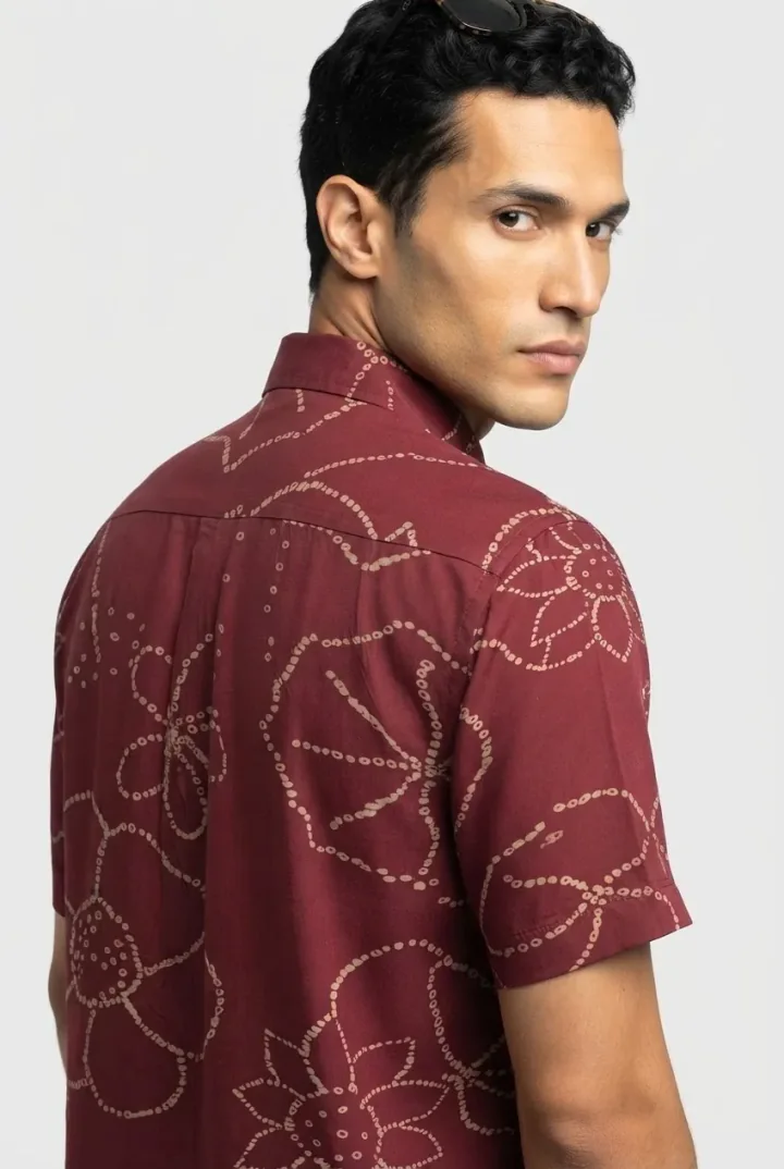 Generated back view of a model wearing the burgundy floral-print shirt