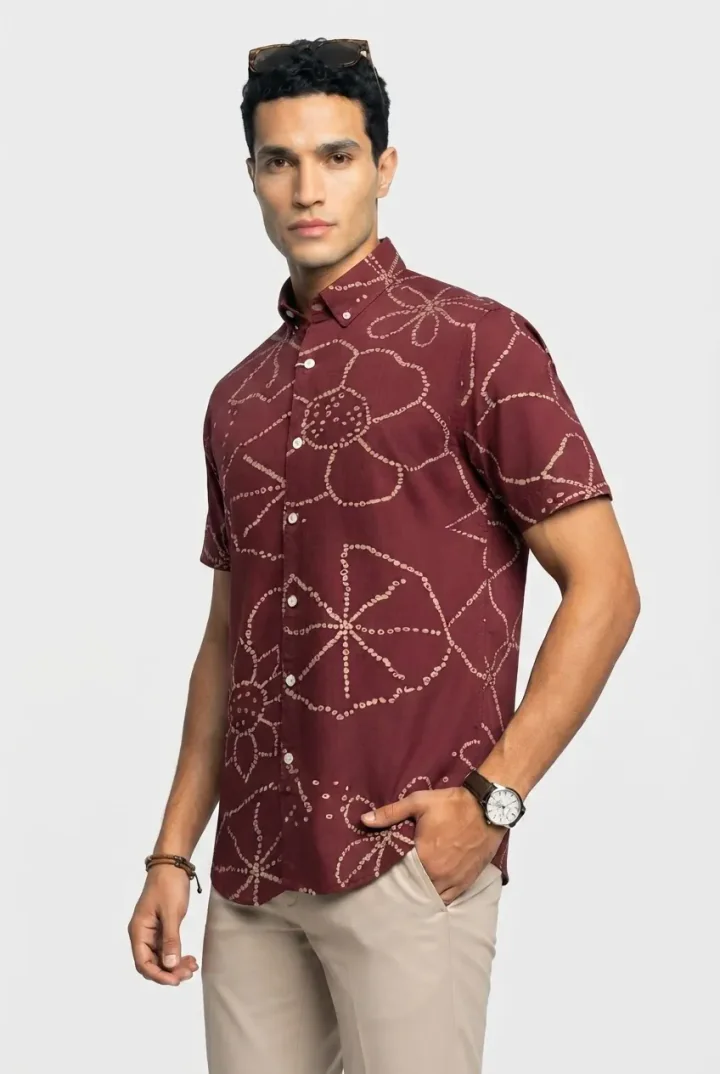 Generated three-quarter model image wearing the burgundy floral-print shirt