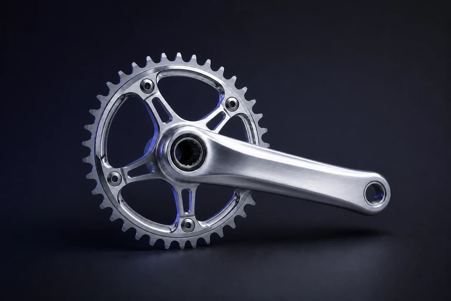 A precision bicycle crank component in a dark product-image demonstration